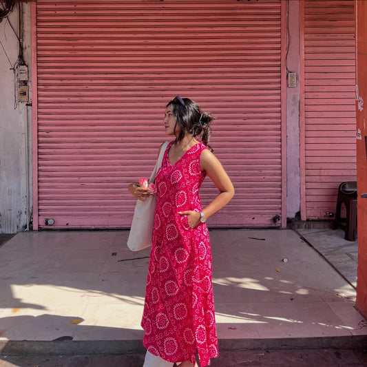 Rani Pink Sleeveless Anarkali Kurti with White Bandhani Print