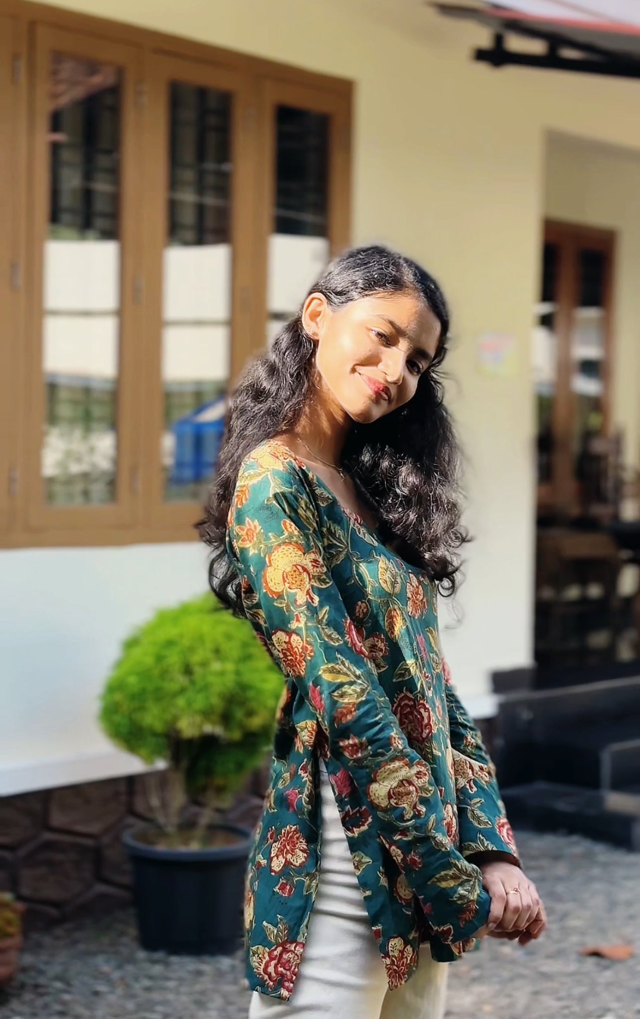All-over floral print featuring traditional, intricate flower and leaf motifs.
